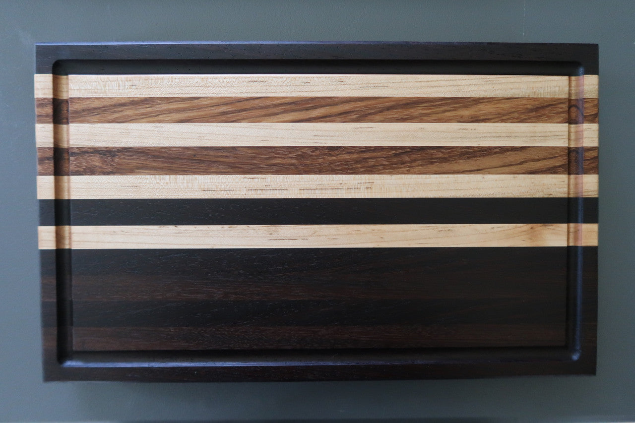 PERUVIAN WALNUT, WENGE, ZEBRAWOOD AND MAPLE CUTTING BOARD