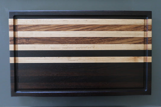 PERUVIAN WALNUT, WENGE, ZEBRAWOOD AND MAPLE CUTTING BOARD
