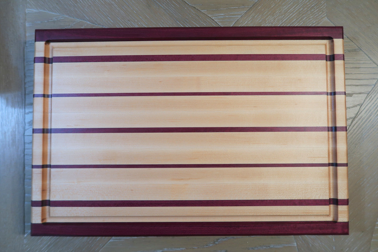 PURPLE HEART & MAPLE CUTTING BOARD WITH JUICE GROOVE & SOLID BRASS FEET