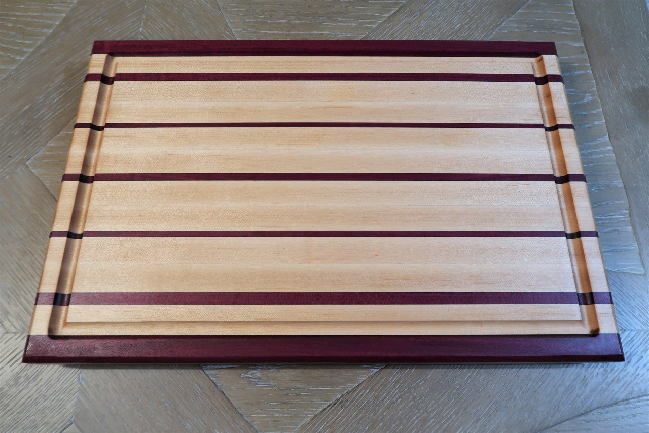 PURPLE HEART & MAPLE CUTTING BOARD WITH JUICE GROOVE & SOLID BRASS FEET